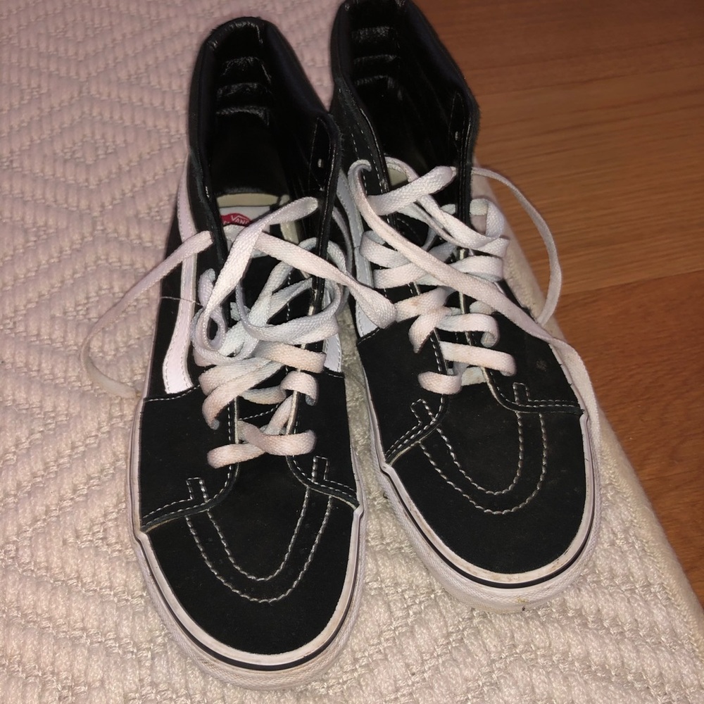 Black Vans high tops